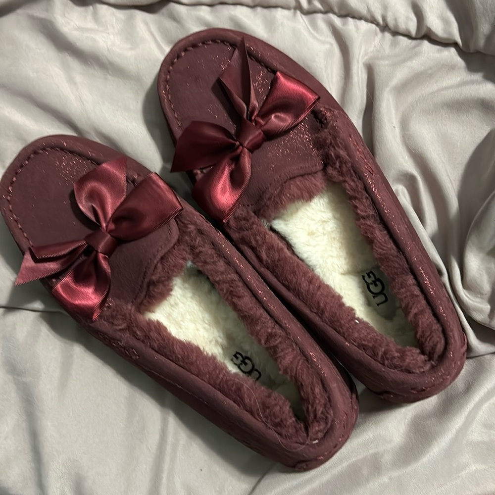 Size 8 maroon slippers. Inside or out. New with stickers still on the bottom.